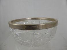 A Cut Glass Fruit Bowl with Silver 800 Rim.