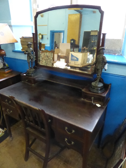 Edwardian mahogany dressing table having a bevelled glass mirror and two small drawers to the top,