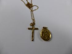 A 9 ct Gold Locket together with a Birmingham hallmark 9 ct gold chain and cross pendant, 7.2 gms.