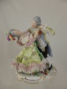 Sitzendorf Figurine, depicting a Dancing Couple, factory marks to base, 22 cms h.