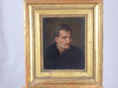 A circa 19th century oil on wood depicting a rugged faced gentleman, the picture in gilt frame