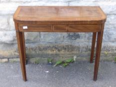 A mahogany serpentine card table, decorative skirt with cabriole legs, green baize interior, 91 x