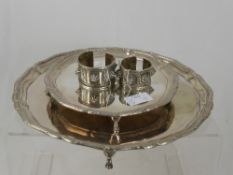 Silver Plated Circular Tray with scalloped edge and ribboned decoration on hoof feet, together with