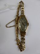 A Lady`s 9ct Gold Art Deco Rose Gold Dress Watch, the watch having a 9ct bracelet with Swiss made