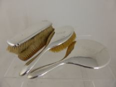 Solid Silver Dressing Table Set, comprising three brushes and a hand mirror. Birmingham hallmark