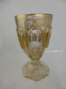 An Antique Bohemian Goblet, intricate gilded scroll decoration, raised oval name rondel reads `