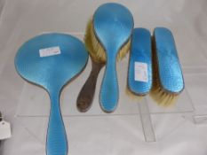 Solid Silver and Enamel Lady`s Dressing Table Set, including a hand mirror, two hair and two