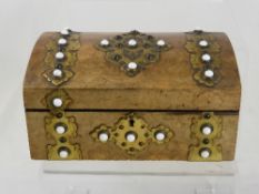 A Walnut Jewellery Box with decorative brass banding, white porcelain beading, purple silk lining