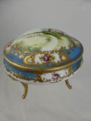 Circa 1920, Noritake trinket dish on gilded legs, hand painted with a tranquil scene.