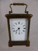 Antique Brass Continental Carriage Clock, white enamel face with Roman dial.