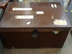 A vintage wooden trunk with metal banding and leather handles, approx. 75 x 51 x 39 cms.