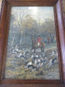 Oiliograph of a hunting scene having a signature, framed and glazed, approx. 33 x 51 cms.