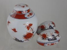 Five pieces of Satsuma porcelain comprising two pillar vases (28 cms.) two lidded egg shaped