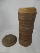 An antique large Treen ware canister containing a chalice with finely carved cups.