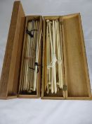 Collection of bone crochet needles, contained in two decorative wooden boxes and a vintage