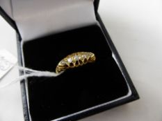 A Lady`s 18ct Yellow Gold Five Stone Old Cut Diamond Ring, Size M, approx 3 gms. 14 pts.