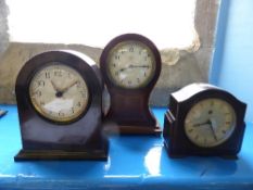 Three Clocks including an Edwardian mahogany inlay Watkins Lincoln`s Inn London mantel clock, a