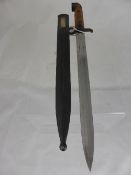 An army bayonet with sheath, plaque reads Major John Pavey, Milatt,Sverige,1952 - 1953.