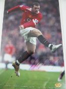 Three sporting photographs depicting three Manchester United players one being ""Rooney"", another