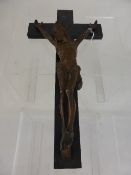 Antique bronze figure of Christ on an ebonised cross, approx. size of cross 39 x 20 cms.