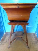 Victorian mahogany sewing / work table on slightly splayed legs united by stretchers and an under