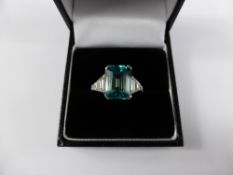 A lady`s 18 carat white gold blue zircon and diamond ring, zircon 6.6 cts, size N, 5.5gms.