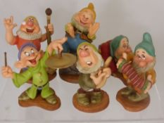 Walt Disney classic collection animation art sculptures depicting Snow White and the Seven Dwarfs,