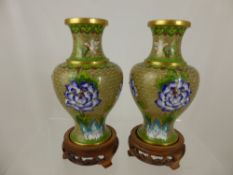 A pair of Cloisonne Vases, with tree peony on cloud scroll design on rosewood stands, approx 18