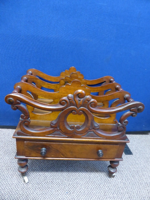 A mahogany Victorian Canterbury, the Canterbury having a carved front screen with four segments,