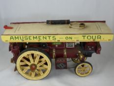 A handmade wooden model of a traction engine named ""Fury"", made by Chas. Burrell & Sons, reads ""