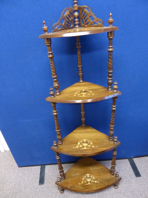 A Victorian rosewood four tier corner ""whatnot"", the ""whatnot"" having inlay to shelves