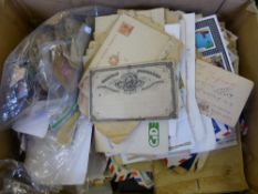 A box of all-world stamps in several albums, loose and on cover.