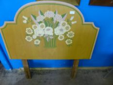 Two hand painted single bed headboards having floral decoration, approx. 91 cms. wide.