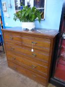 Edwardian mahogany chest of drawers having two short and three long drawers with brass drop