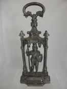 An Antique Cast Iron Doorstop in the form of a knight 45 cms h.