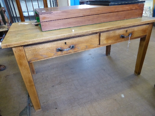 Vintage oak writing table fitted with two drawers on tapered legs, approx. 122 x 69 x 62 cms.