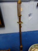 A reproduction brass and copper stick barometer by DEJOKA, London, 93 cms.