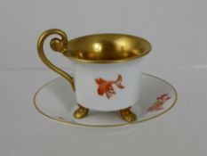 August Roloffs Fine Porcelain Tea Cup and Saucer, gilded interior depicting gold fish.