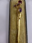 A Gentleman`s 9ct Gold Tourmaline and Seed Pearl Tie Pin, together with a 9ct Amethyst Stick Pin