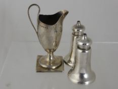 Georgian Milk Jug, London hallmark circa 1792/3 together with two silver condiment dispensers (3)