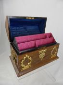 Olive Wood Stationary Box, with decorative brass banding to lid, handles and key plate. The box has