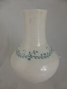 Ruskin vase, cream in colour with delicate leaf scroll decoration to the shoulder (possibly