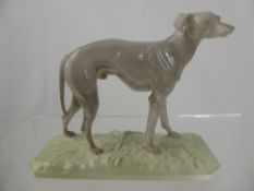 A Nymphenburgh Figure, depicting a Grey Hound, impressed R J Mene to base nr 128.