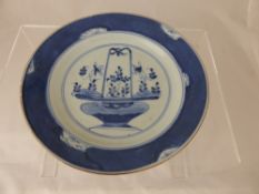 Circa 19th Century Chinese Blue and White Plate, together with a Famille Rose Plate. (2)