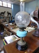 Victorian Glass Oil Lamp, with a turquoise blue reservoir, decorative floral etched globe with the