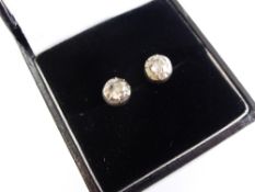 A Pair of solitaire diamond Earrings, approx 0.70 ct, old cut 35 pts each.
