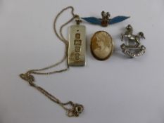 A collection of misc. jewellery incl. silver hallmarked ‘The King’ badge, silver and enamel R A F