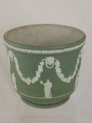 A Wedgwood Jardinière, celadon green depicting the five muses beneath garlands, impressed marks to