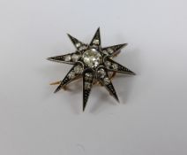 Edwardian Gold and Diamond Pendant/Brooch, the brooch in the form of a star, rose gold brooch set