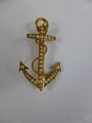 9ct Gilded and Seed Pearl Brooch, in the form of a ship anchor, 4 x 2.3 cms, approx 4 gms.